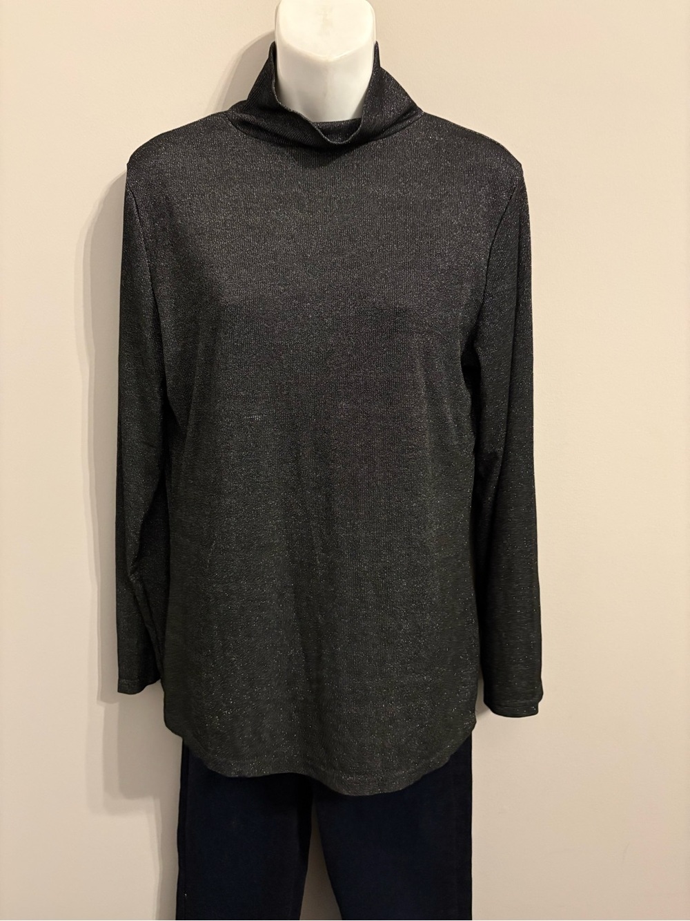 Woman’s Black Metallic Turtleneck Sweater